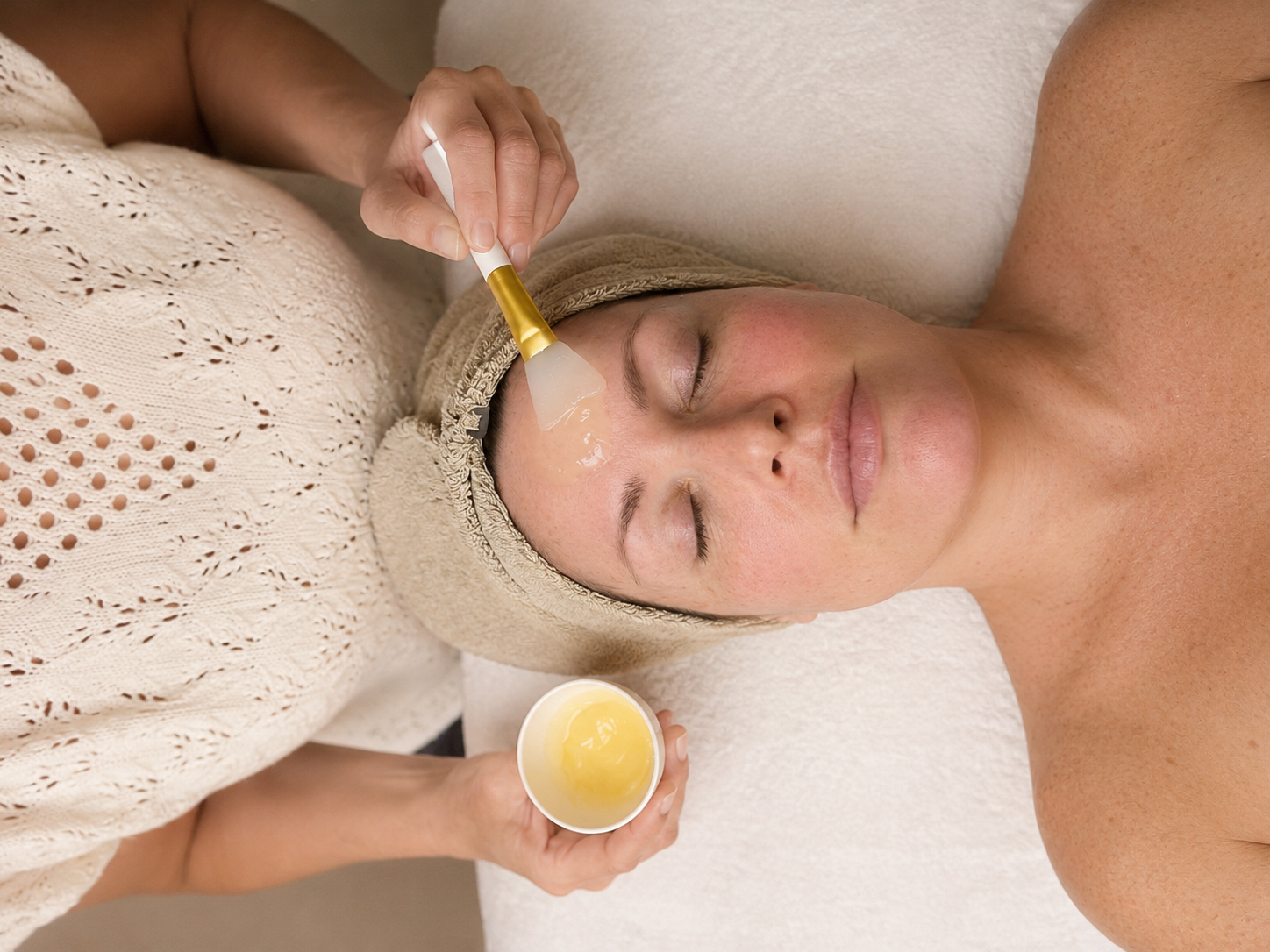 Client receiving a facial treatment at Neural Glow Skin Care
